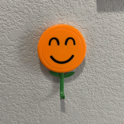 🌻🪝Futavion®Smiling Sunflower Wall Hook – Easy Wall Storage Hack for Keys, Towels, Coats & More, Perfect for Small Spaces